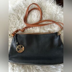 Valentina Black and Tan Crossbody Bag with Structured Silhouette
Valentina